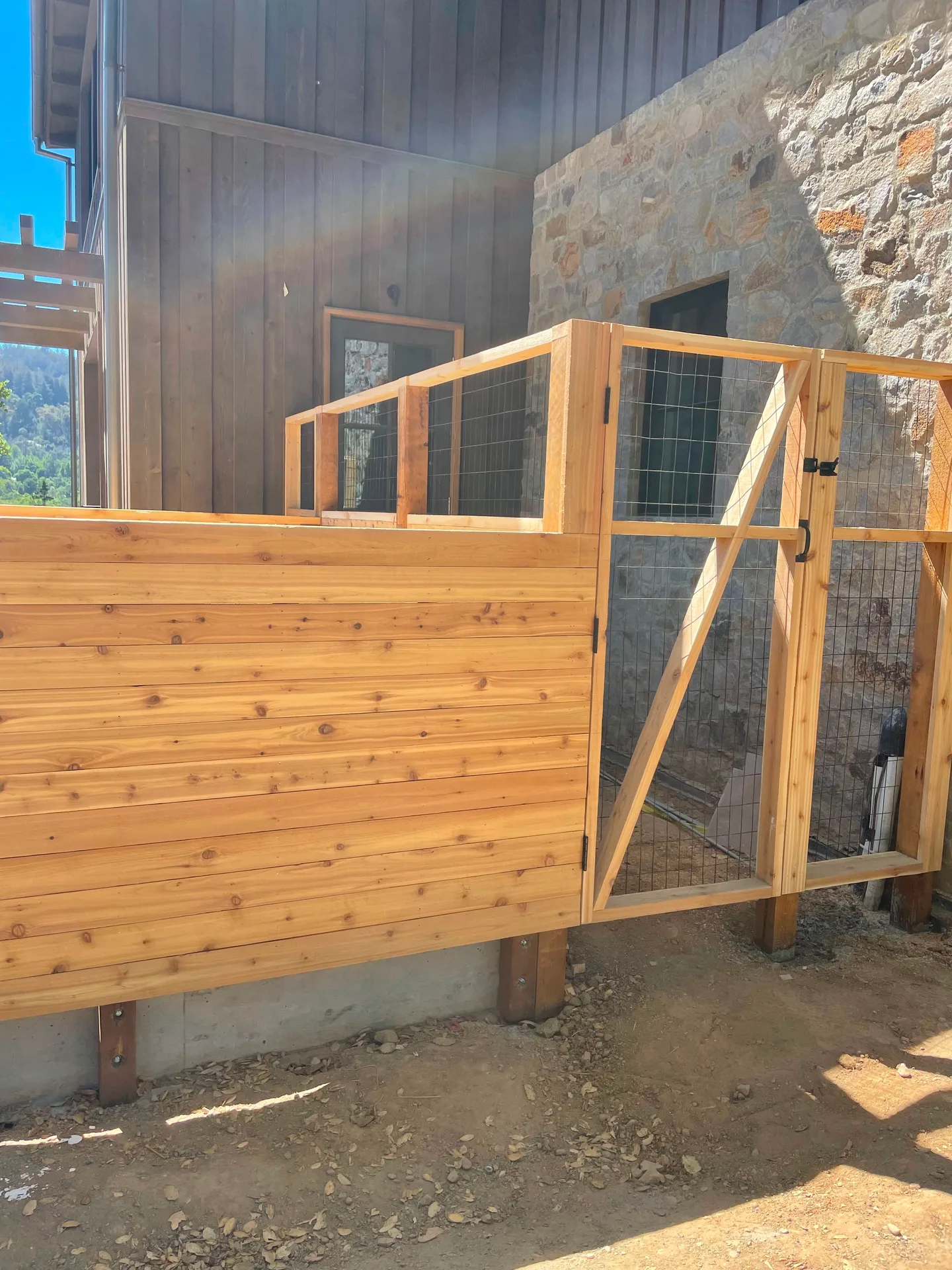 Cedar fence and gate with wire mesh panel