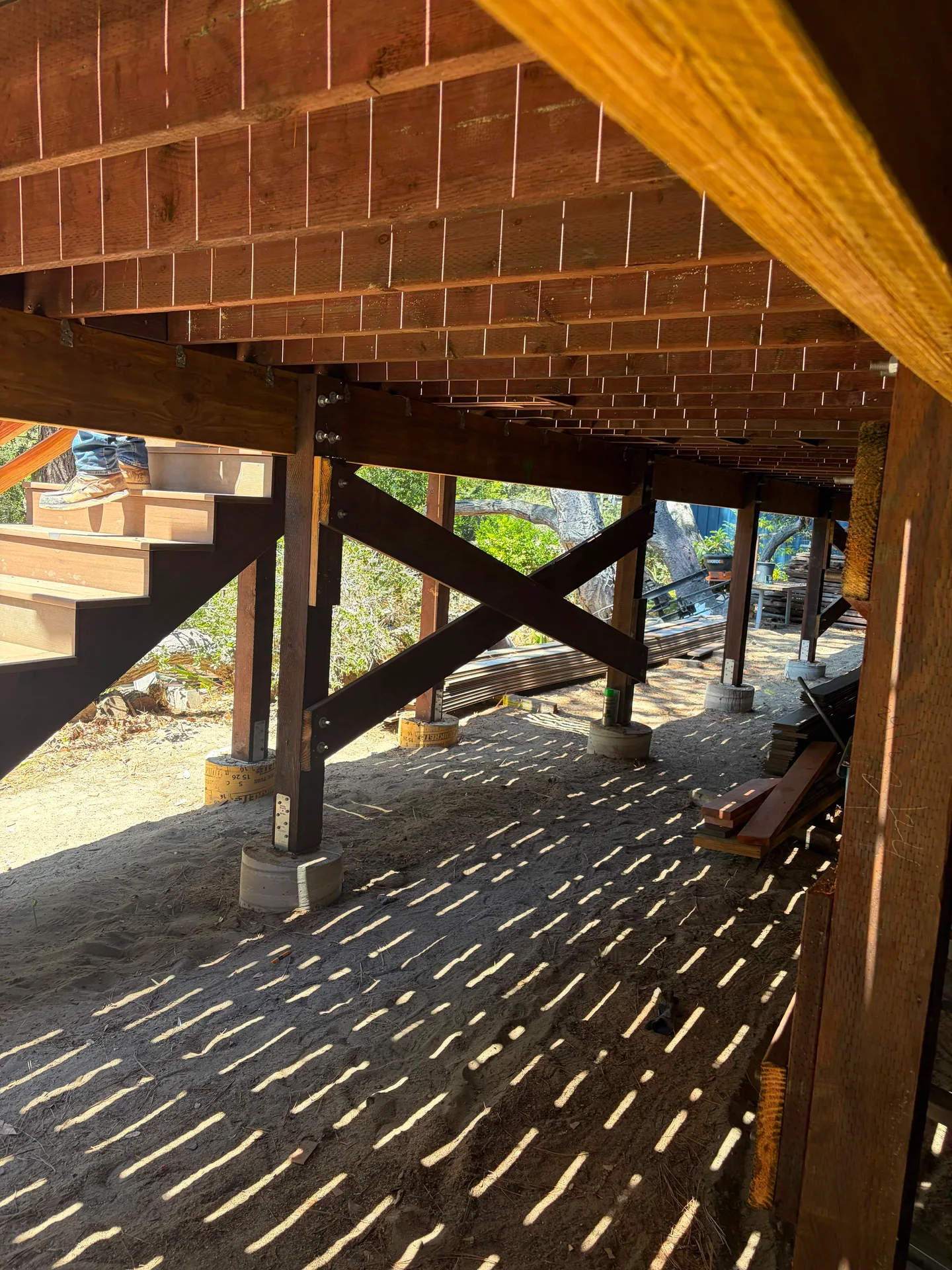 Deck substructure with bracing and concrete piers