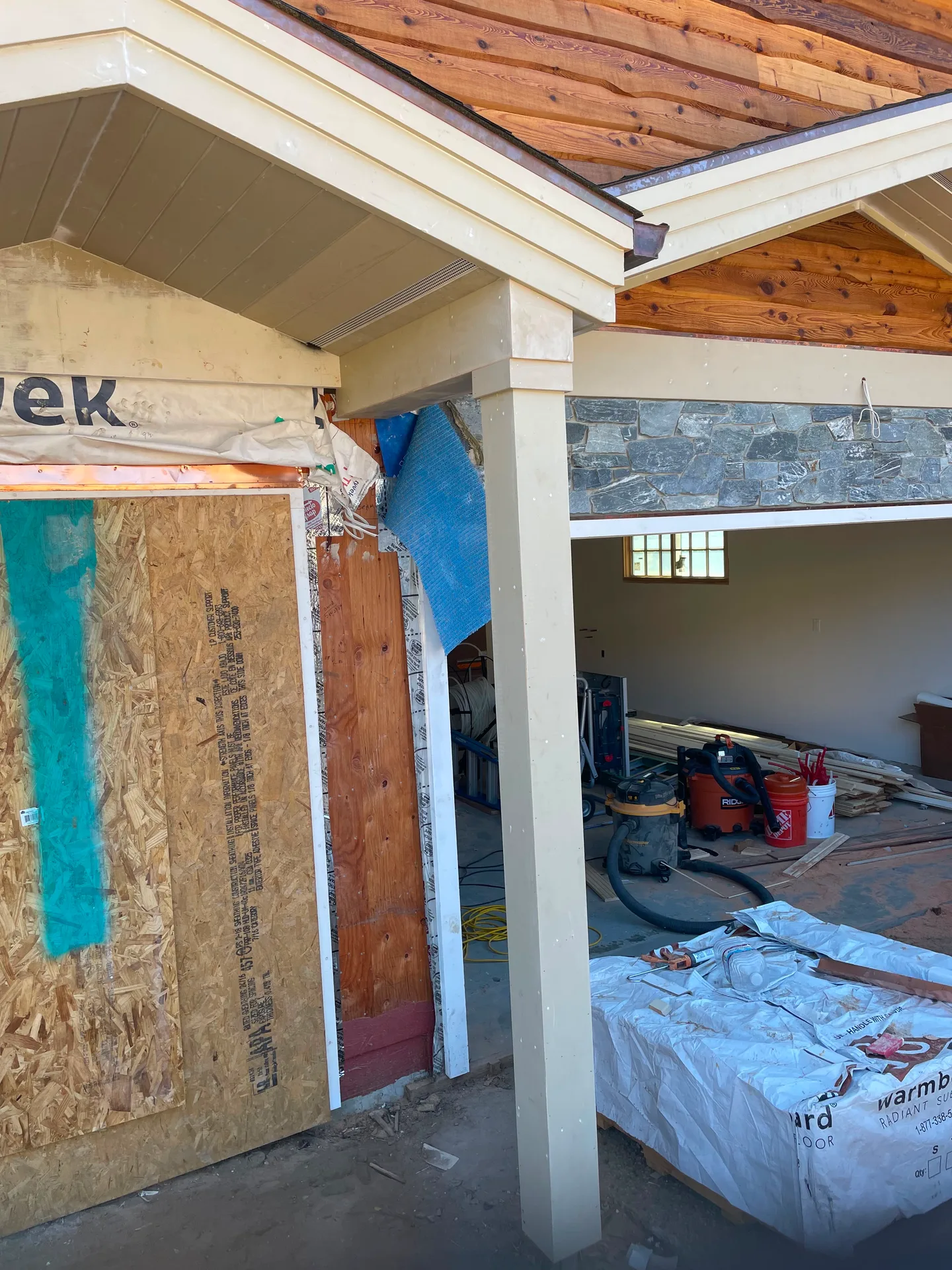 Exterior patio cover with stone trim detail