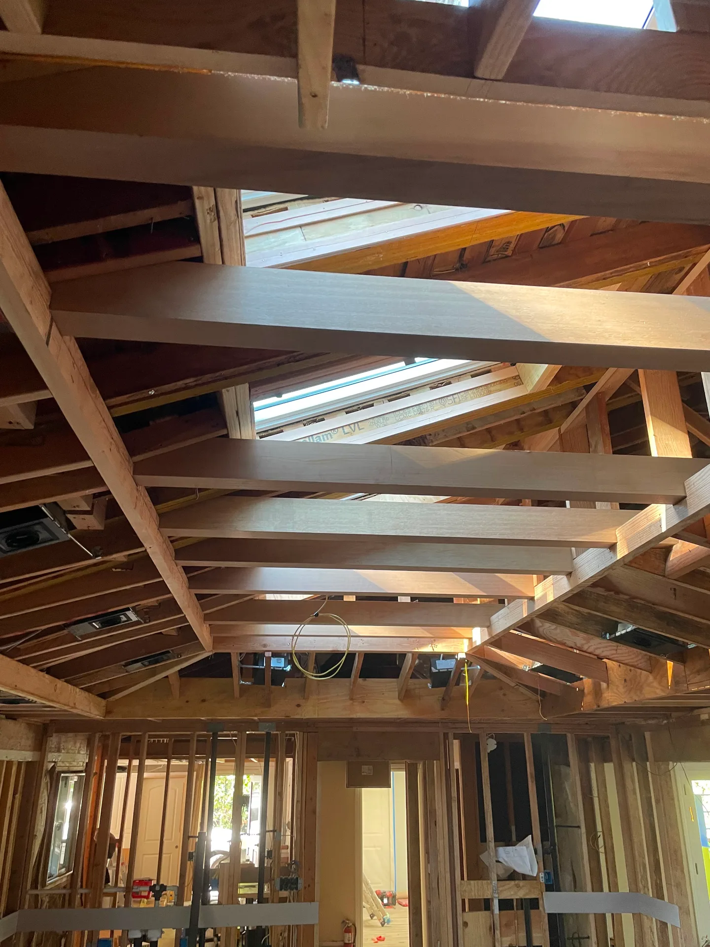 Interior roof framing with LVL beams and skylights